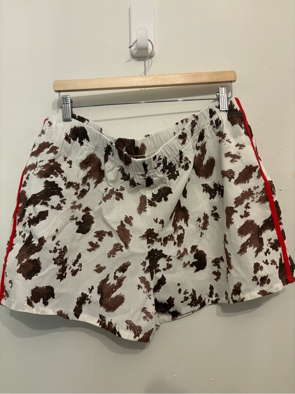 Zoe + Liv White & Brown Cow-Print Athletic Shorts with Red Side Stripe